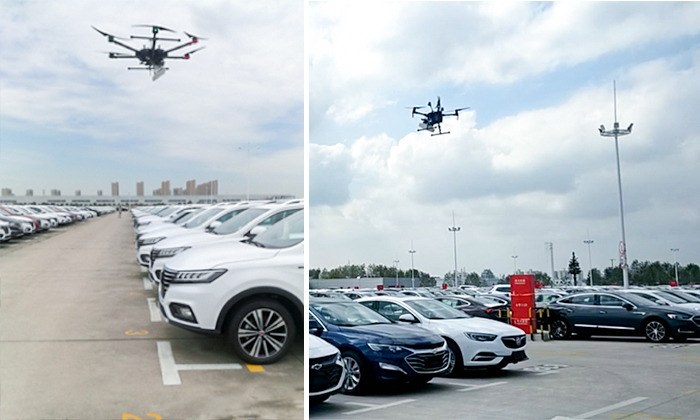 Drone monitoring a large car inventory lot showcasing Impinj's asset management technology