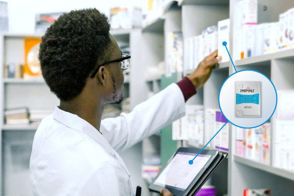 Pharmacist using Impinj RFID technology for inventory management in a pharmacy