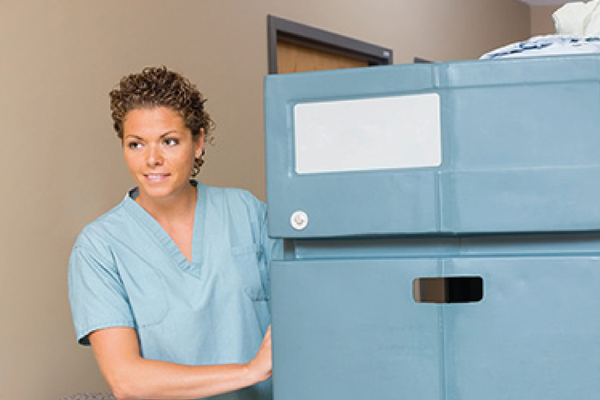 photo-of-nurse-woman-pushing-cart