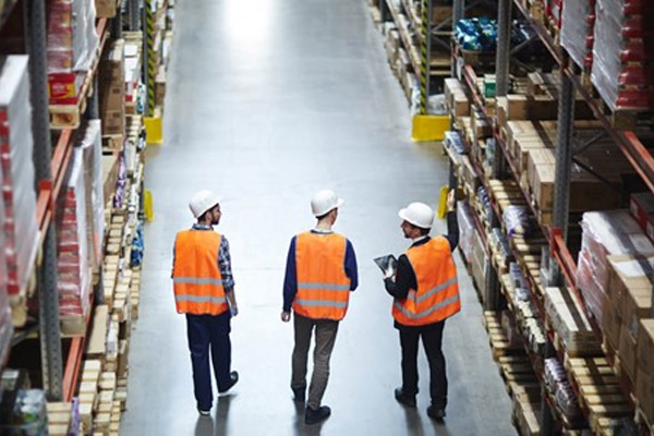 photo-of-men-in-hard-hats-warehouse