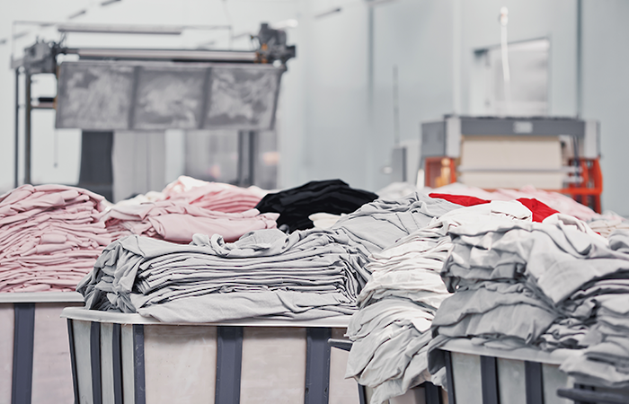 In the bustling environment of a modern textile factory, this image captures a snapshot of
