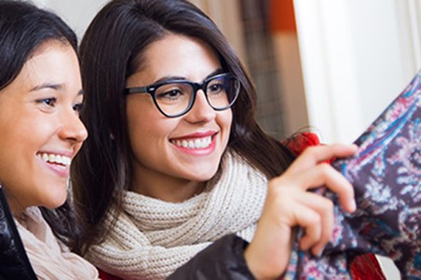 photo-of-two-women-smiling