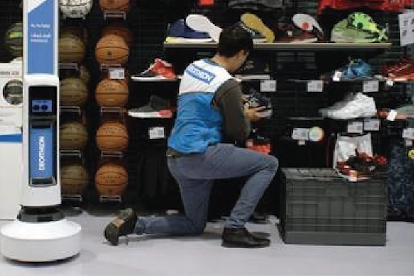 photo-of-man-kneeling-at-shoe-rack
