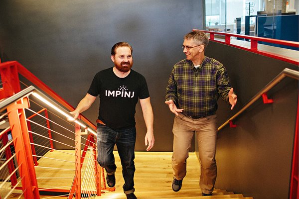 two-guys-walking-up-stairs