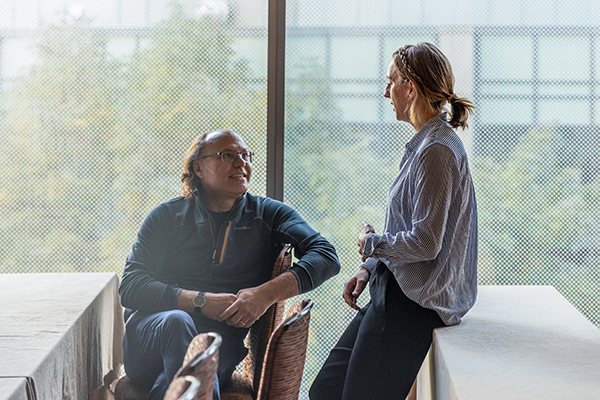 two-people-looking-at-screen