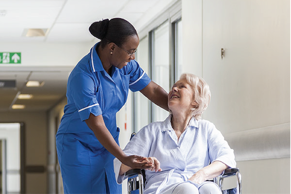 Nurse-pushing-wheelchair