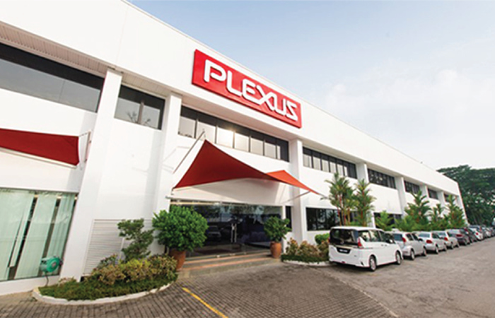 The image showcases the modern facade of a Plexus office building, a leader in