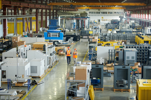 people-walking-through-factory-floor