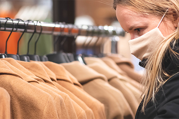 photo-of-woman-in-mask-shopping