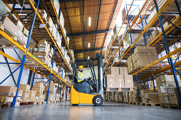 forklift-lifting-boxes-in-warehouse