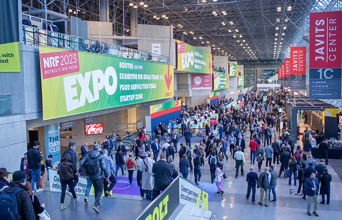 The bustling atmosphere of the NRF 2023 Expo at the Javits Center