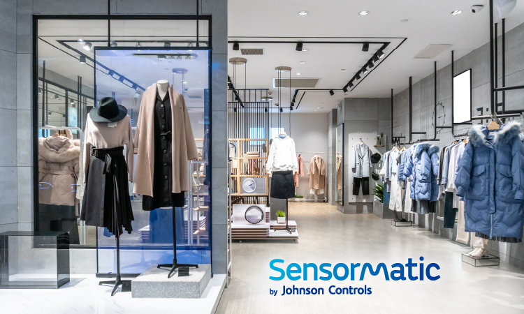 Interior of a contemporary clothing store with Impinj E-Series product, enhancing the shopping experience through smart inventory management.