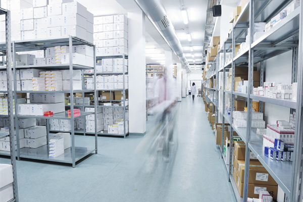 This image captures the dynamic environment of a modern warehouse managed by Impinj technology
