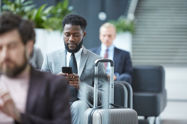 waiting-in-check-bag-line-at-airport