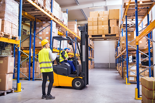 forklift-lifting-boxes-in-warehouse