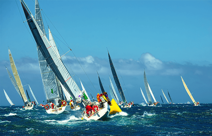 A thrilling sailing regatta with vibrant yachts competing on the high seas, their